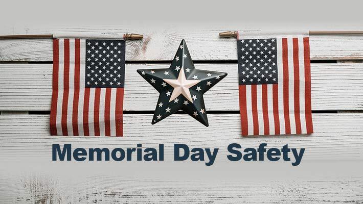 Memorial Day Safety. Two small American flags on each side of a star.